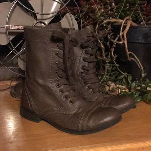 Brown/dark gray moto or army boot. Size 7.